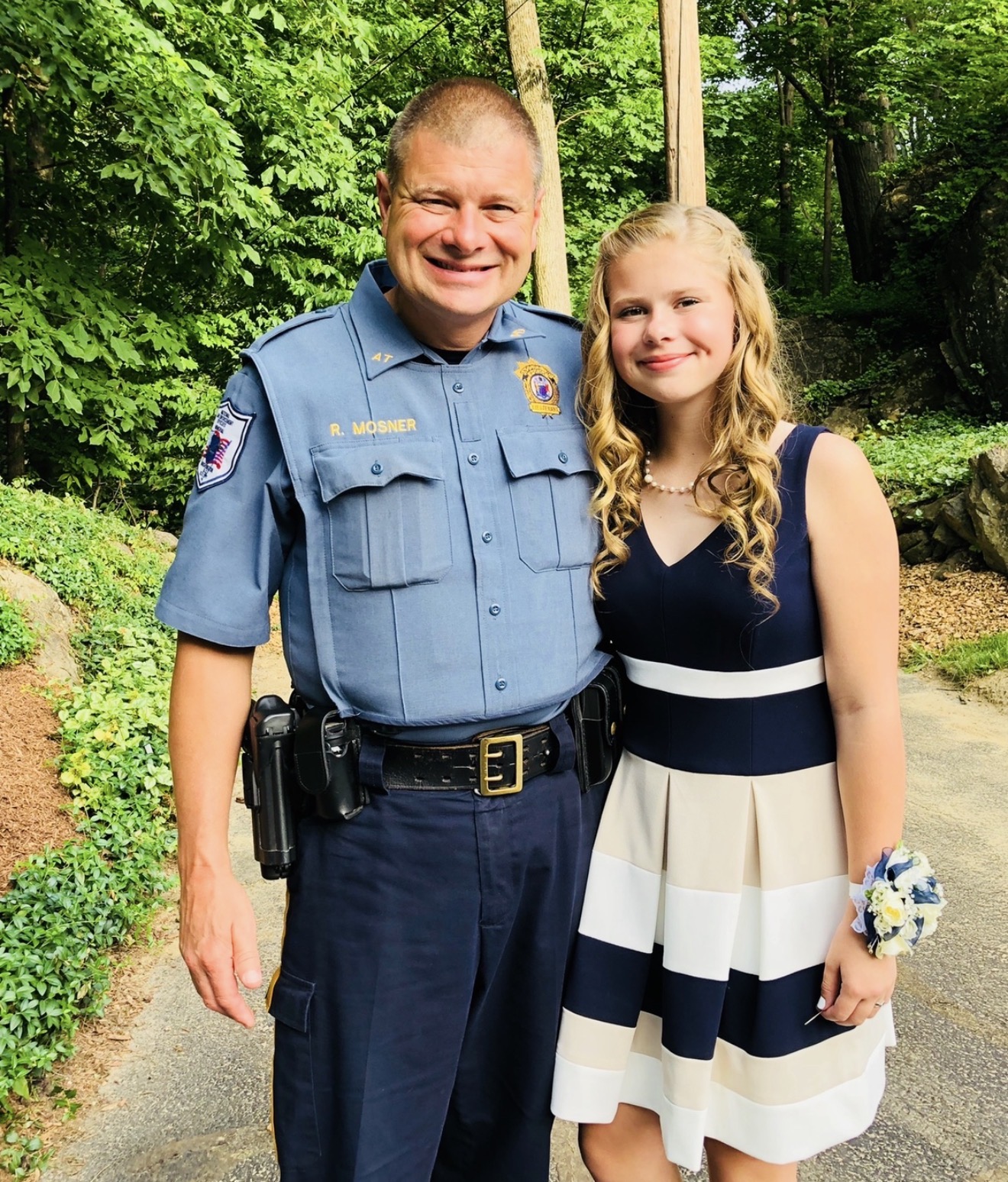 Rod Mosner in uniform with his daughter
