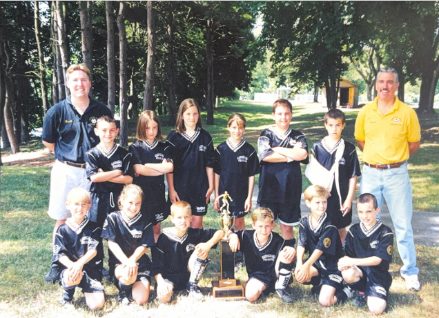 Tom Walsh coaching an Andover youth soccer team
